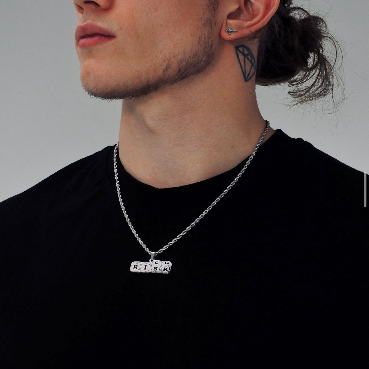 Neck pendant «RISK & RICH»