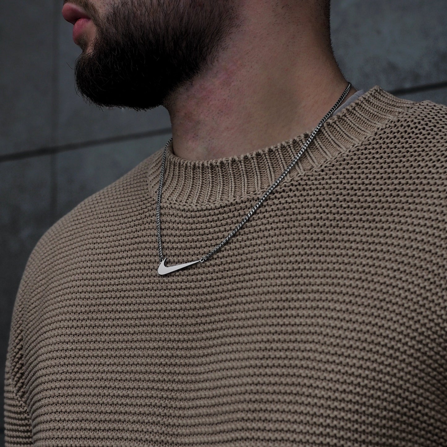 Neck pendant «NIKE SWOOSH»