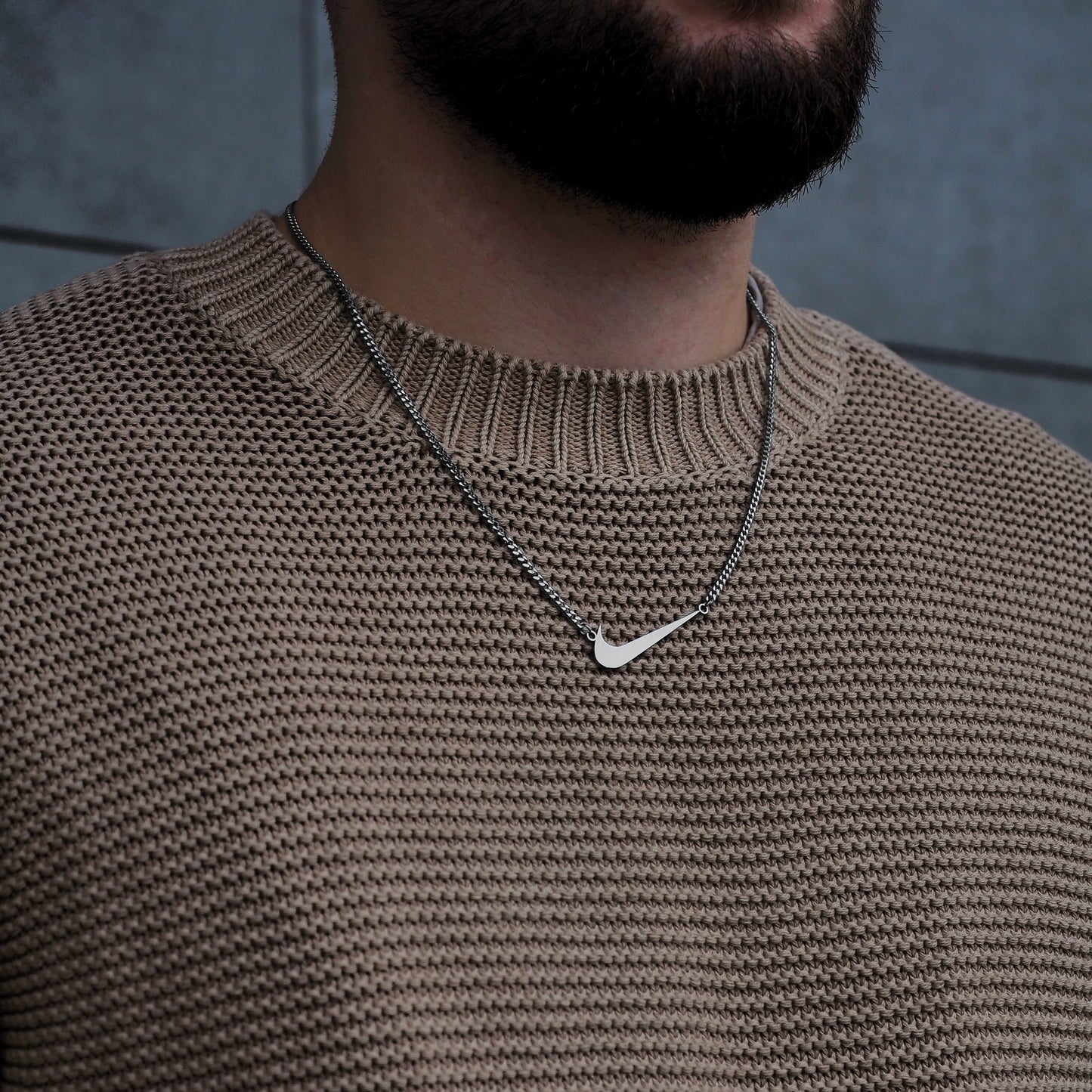 Neck pendant «NIKE SWOOSH»