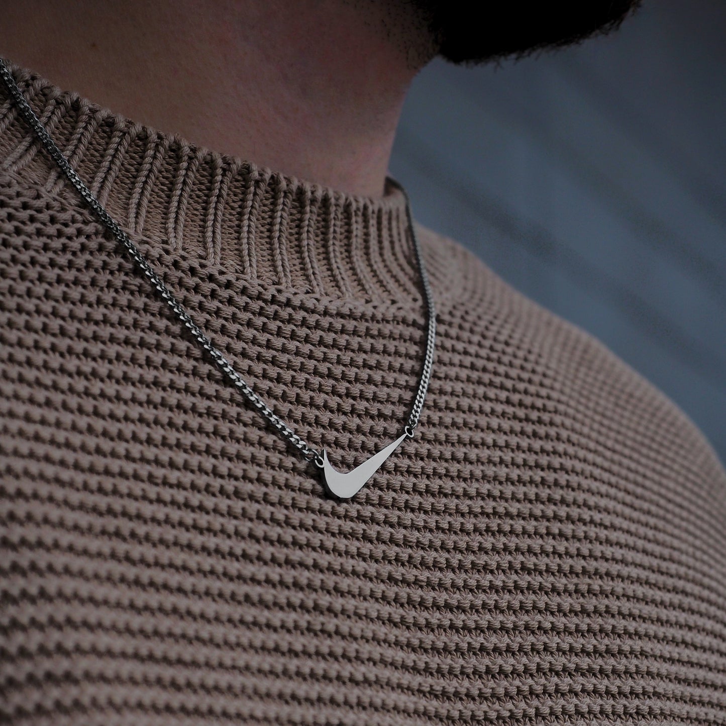 Neck pendant «NIKE SWOOSH»